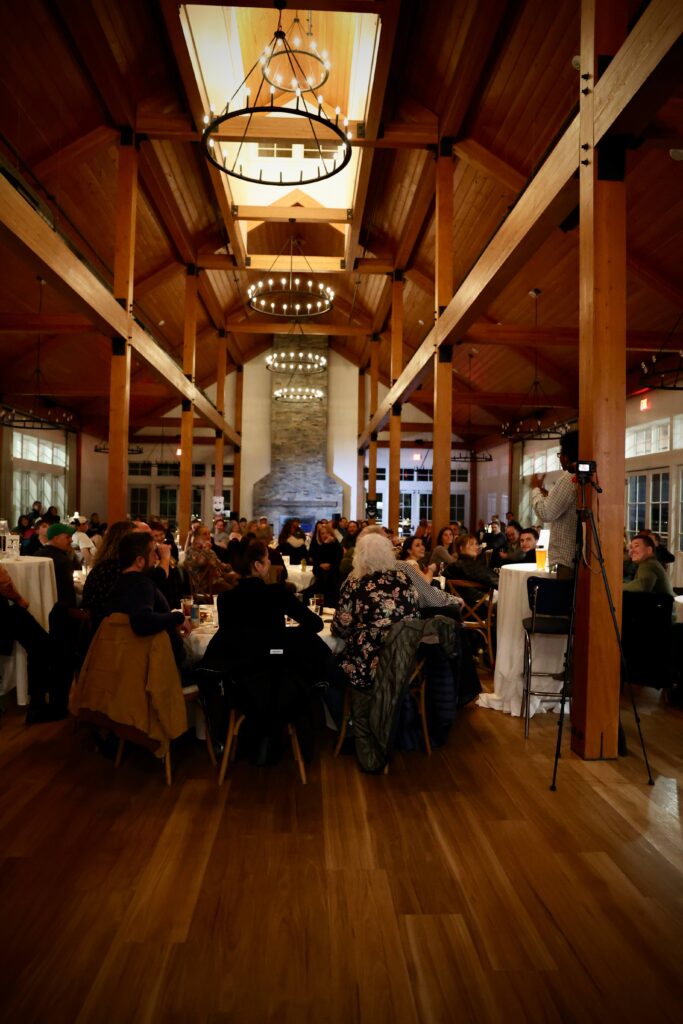 Guests enjoying the 19th Hole Comedy Show at Owl’s Nest Resort in the Lakehouse